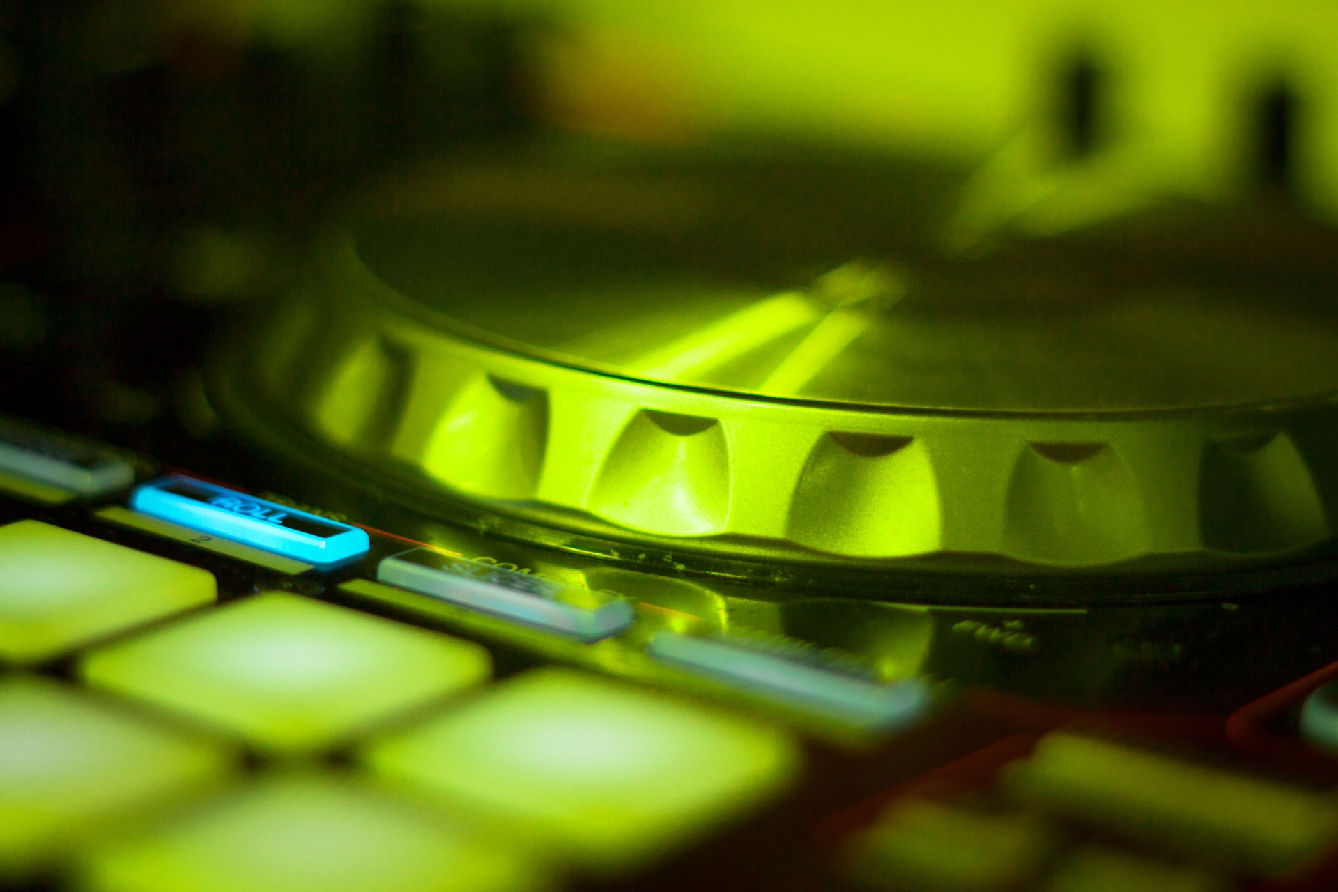 Ibiza dj turntables for deejay mixing in nightclub house music party at night during techno show.