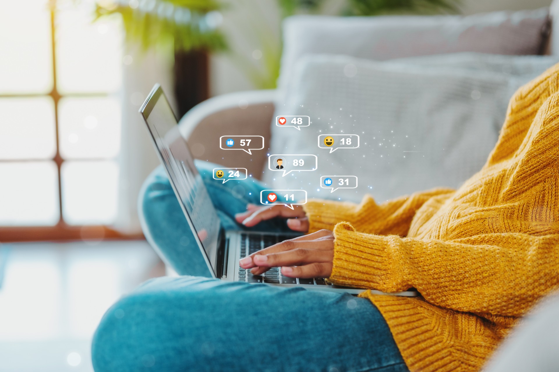 African American teenage woman using a smartphone ,Laptop with Icon communication network social media network pop notification  concept.