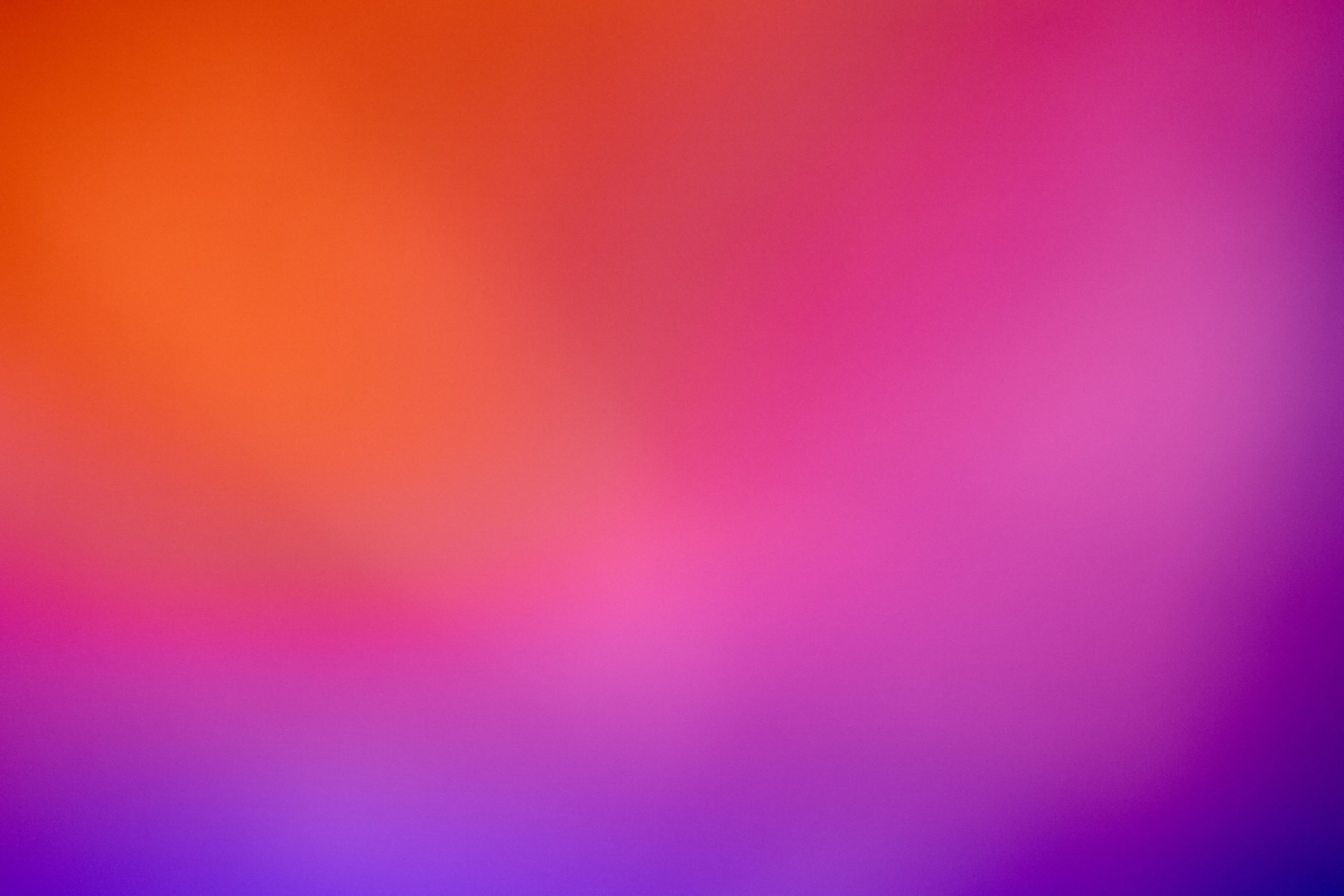 Abstract defocused lens red light leak on blue background